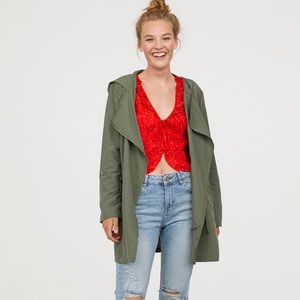 Green drawstring parka jacket